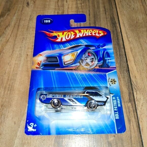 Hot Wheels Deora #199 Roll Patrol Riptide Rescue Police Car Die-cast New 2004 - Picture 1 of 4